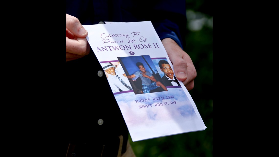 01/08 a memorial card is shown after the funeral for antwon rose