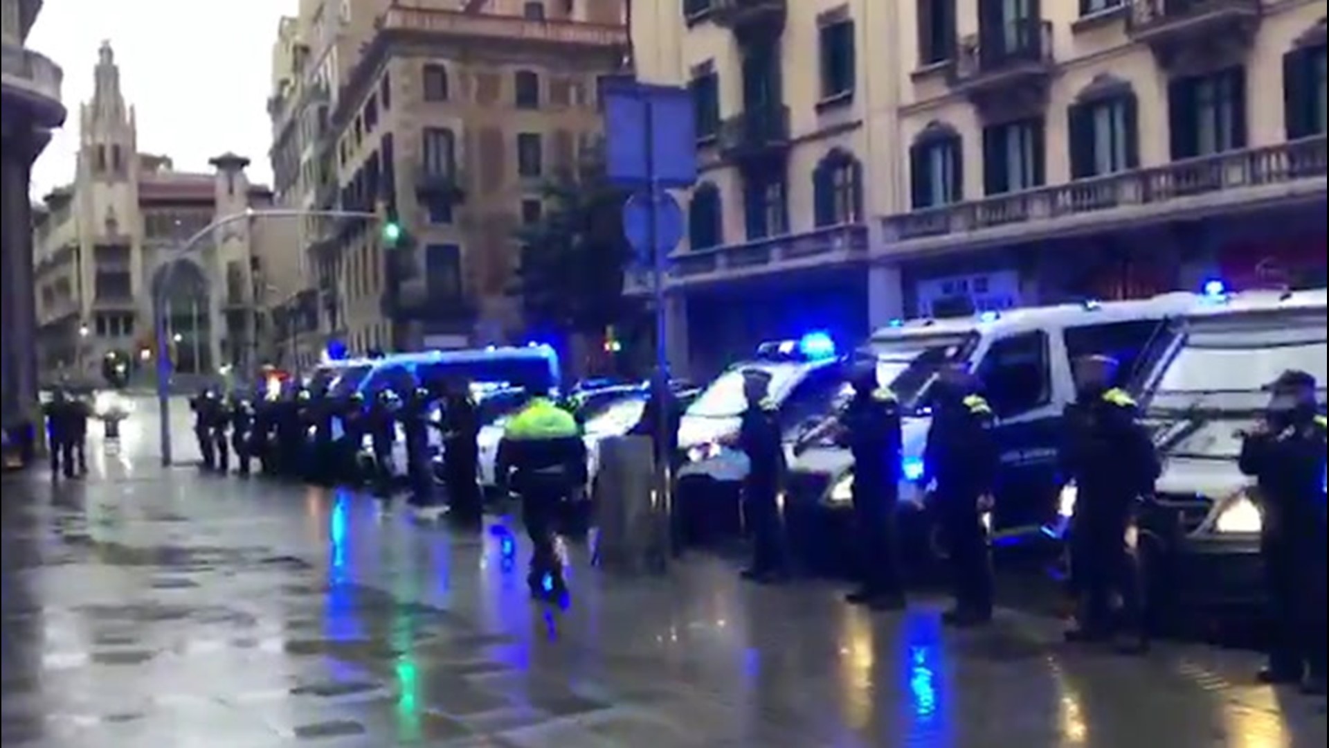 Police in Barcelona, Spain, lined up on April 1 to honor fellow police officer Jose Luis, who died due to complications from the coronavirus.