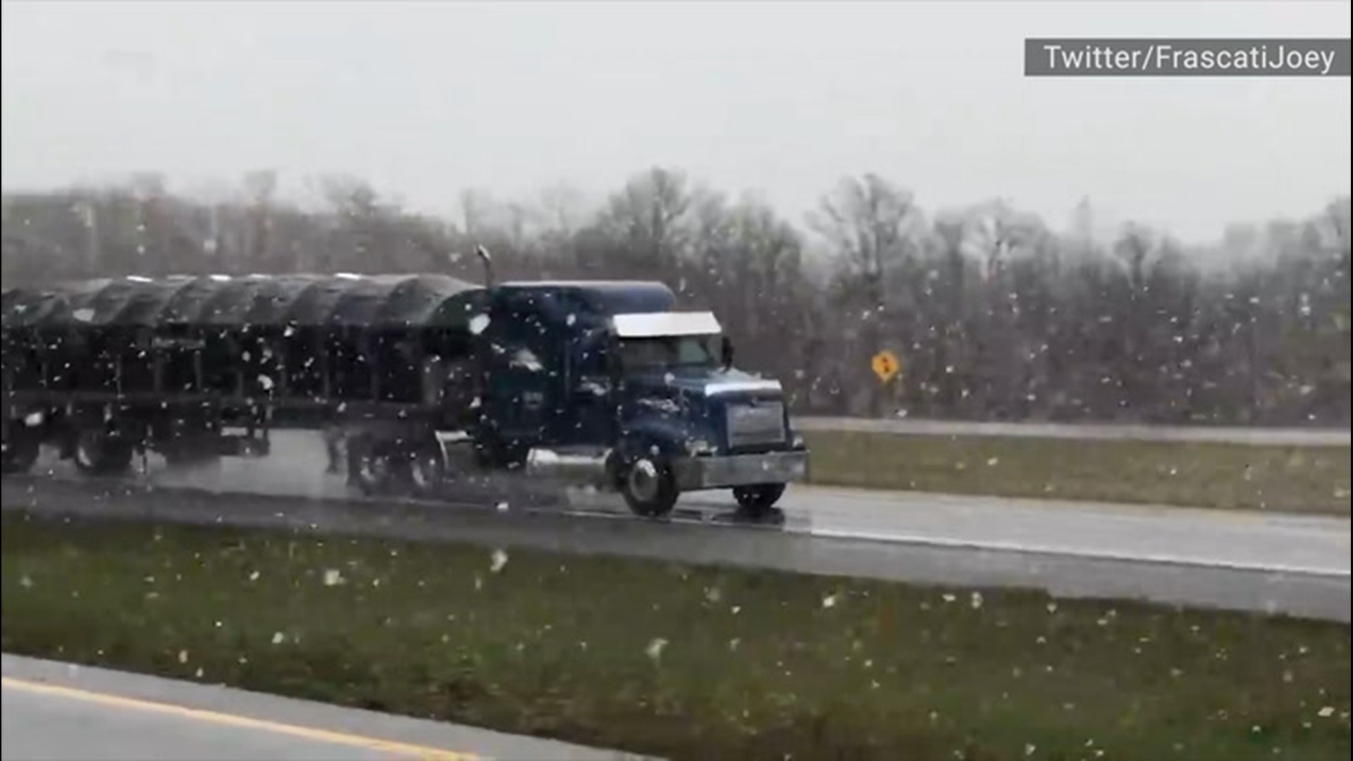 Big snowflakes fell on Interstate 490 in Churchville, New York, on April 8.