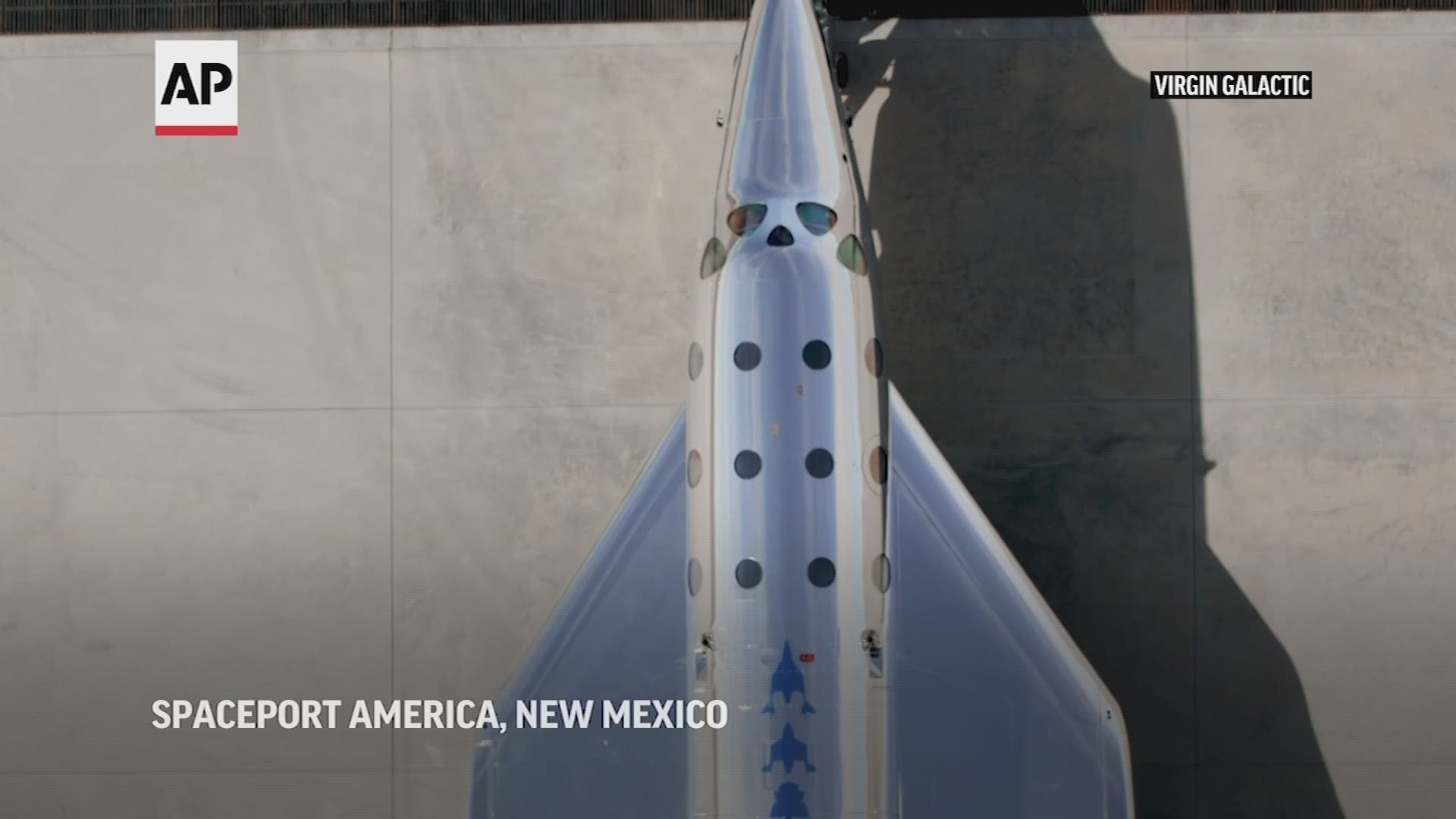 Virgin Galactic rolled out its newest spaceship as the company looks to resume test flights in the coming months at its headquarters in the New Mexico desert.