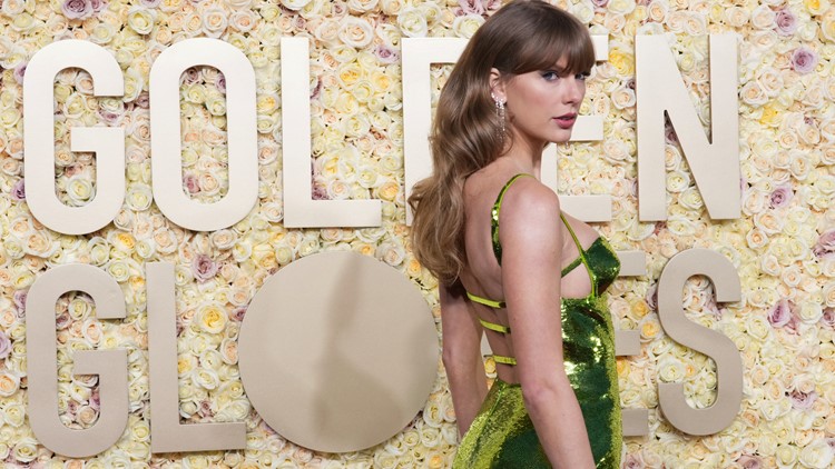 Taylor Swift Holds Court in Green Gucci Dress at Golden Globes 2024