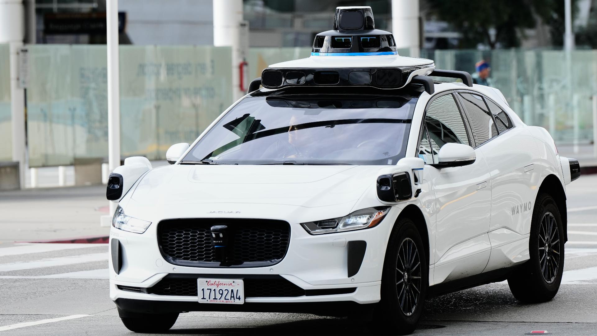 Waymo Software Defect Waymo recalls nearly 3,800 robotaxis after software flaw allowed ...