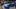 Shoppers look over a 2025 ID.Buzz utility vehicle