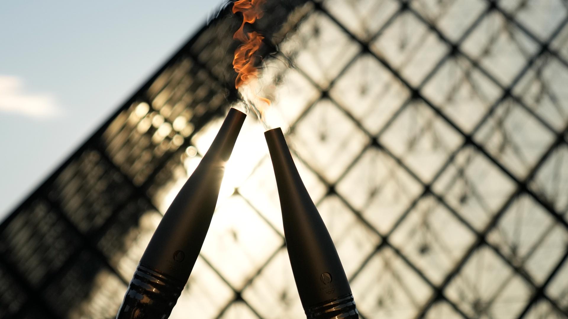 Who is lighting the Olympic cauldron at the Opening Ceremony