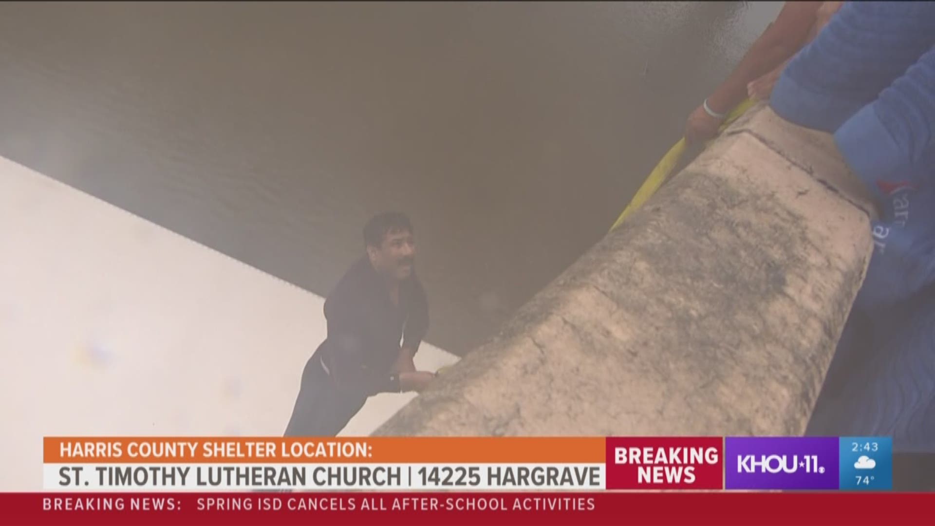 A good Samaritan jumped down and helped save the truck driver after he drove into a flood intersection along the Eastex Freeway.