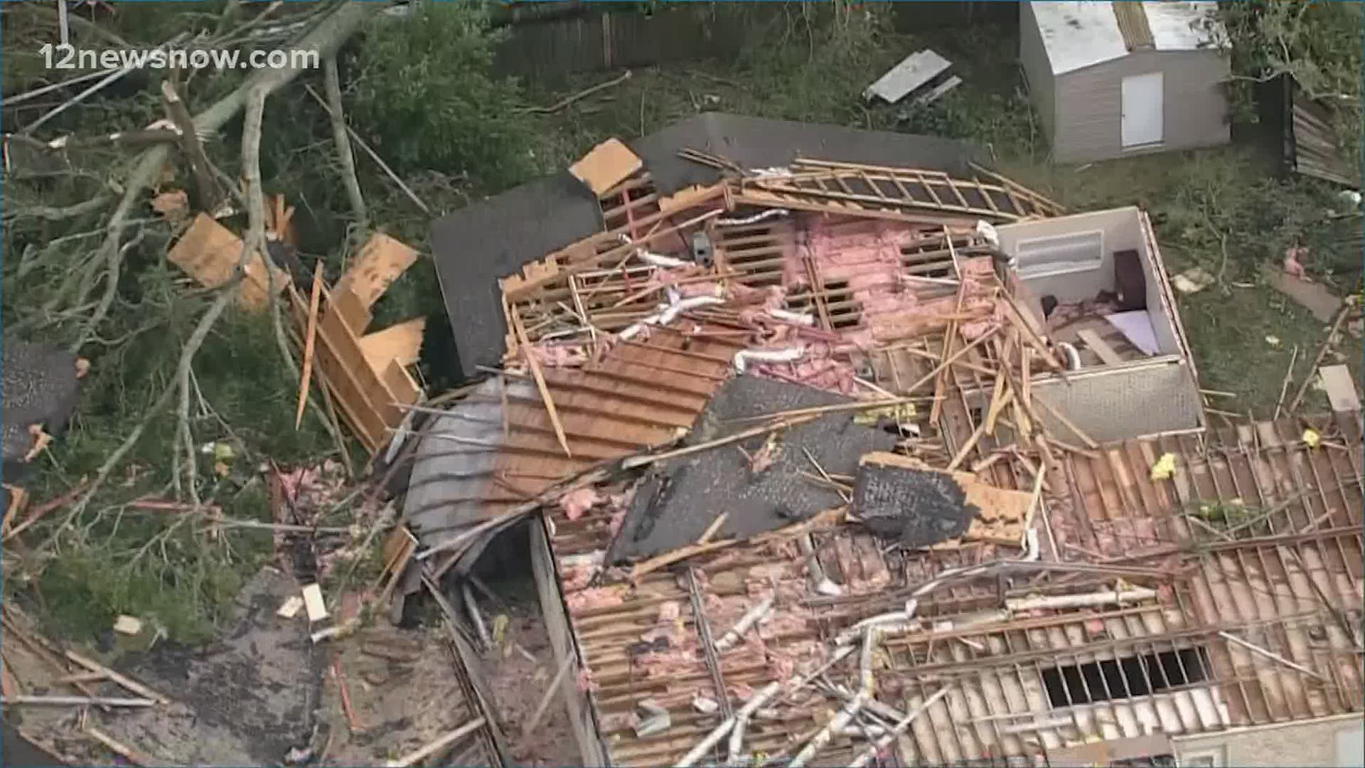 Powerful winds shattered glass and ripped off roofs