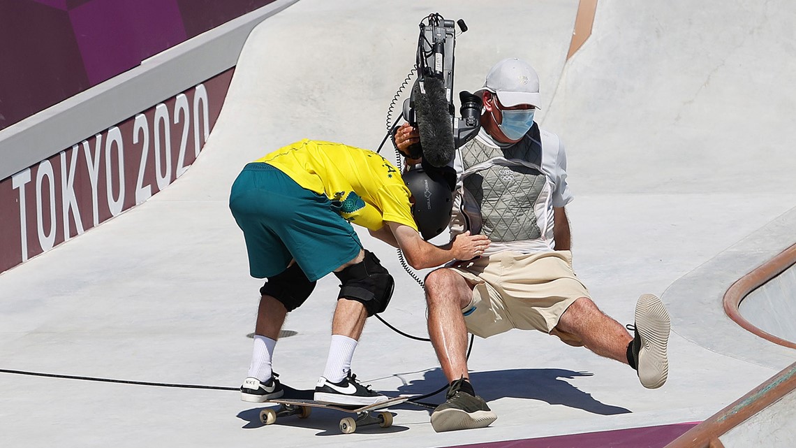 Olympic skateboarder takes out cameraman during run