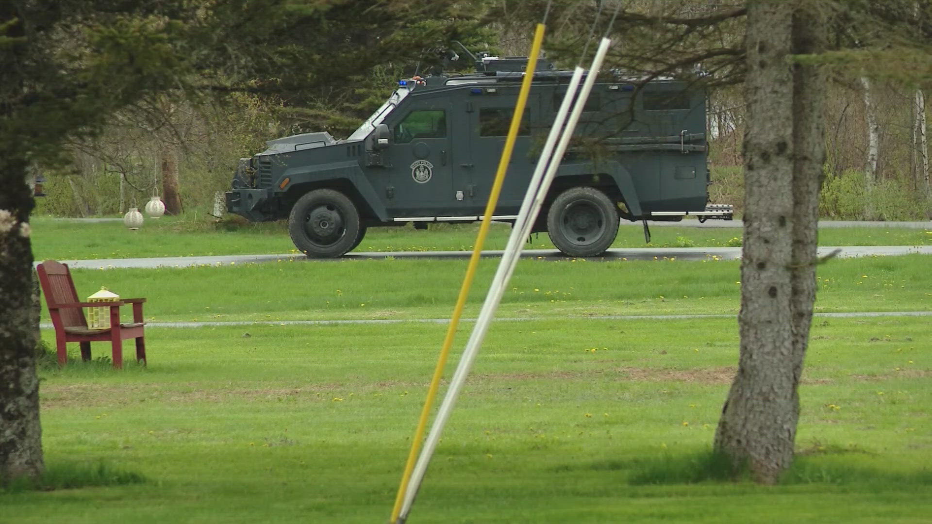 State police say a person has apparently barricaded themselves inside a building in the Kennebec County town.