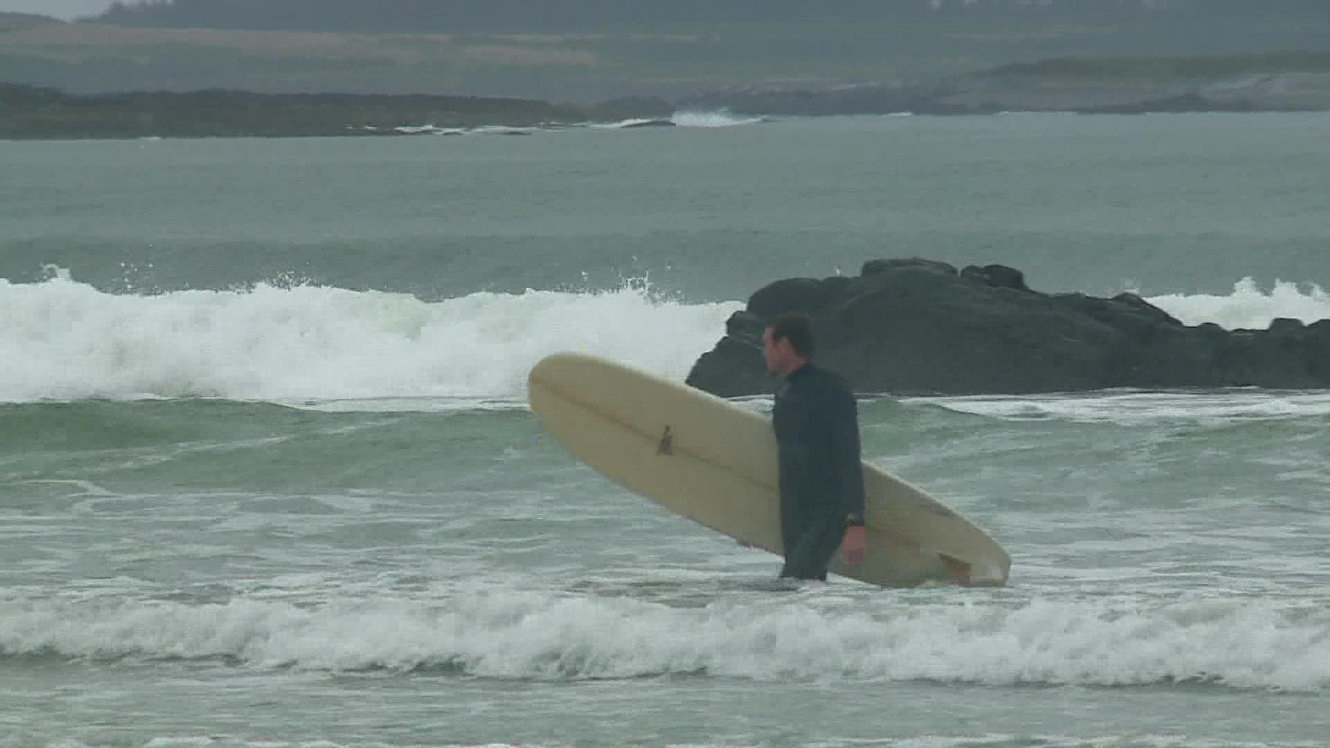 As Wednesday's storm brought choppy waters to Maine shores, local surfers took advantage and hit the waves despite the rain.