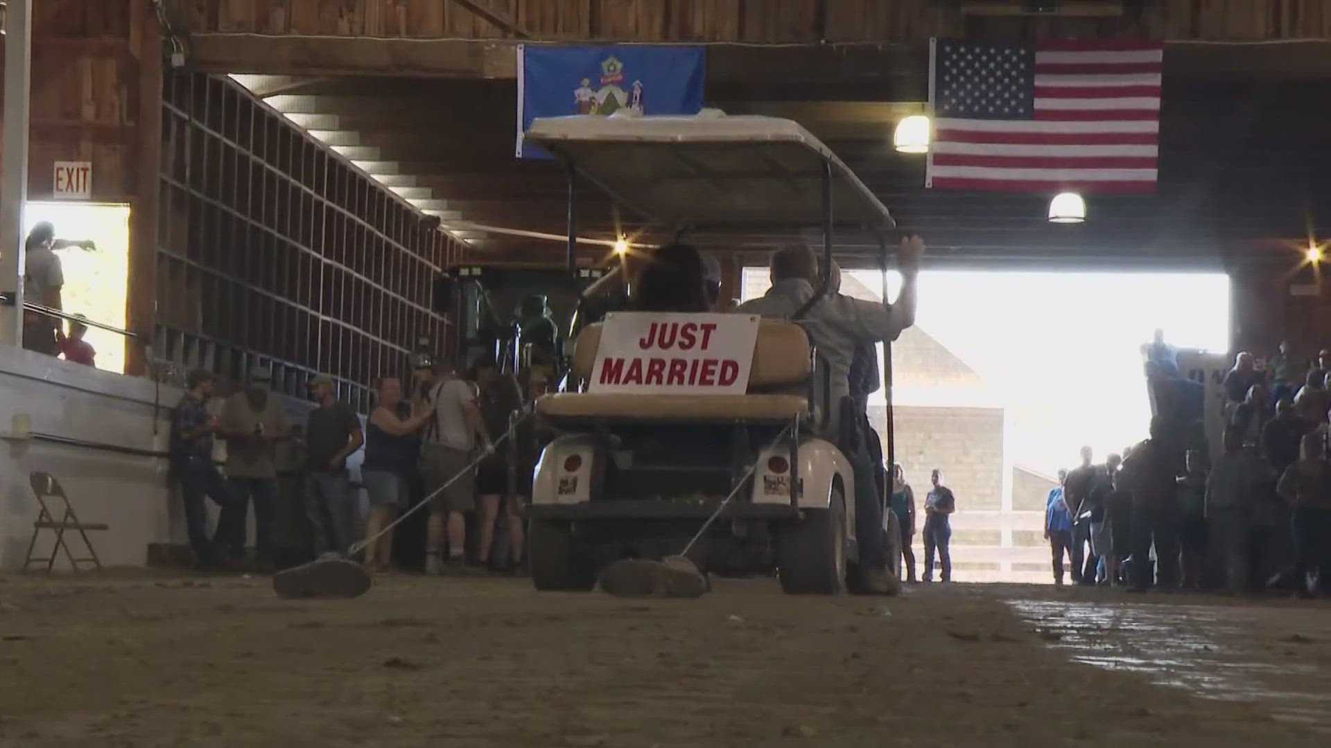 Jim Grover and Kim Shuckerow normally hitch their horses in the fair’s pulling ring, but they were the ones who got hitched Wednesday.