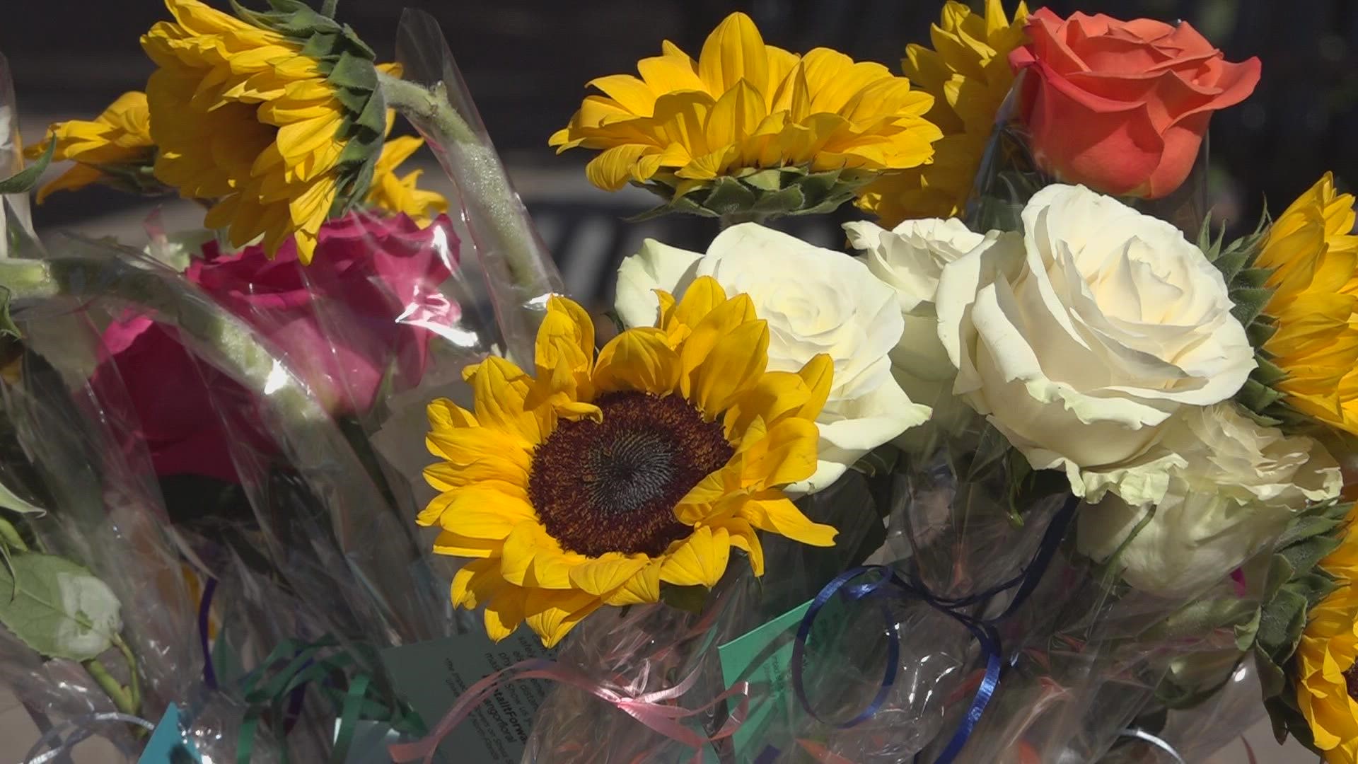"Everyone loves getting flowers and I love just being able to surprise random people on the street," Joseph Langlois said.