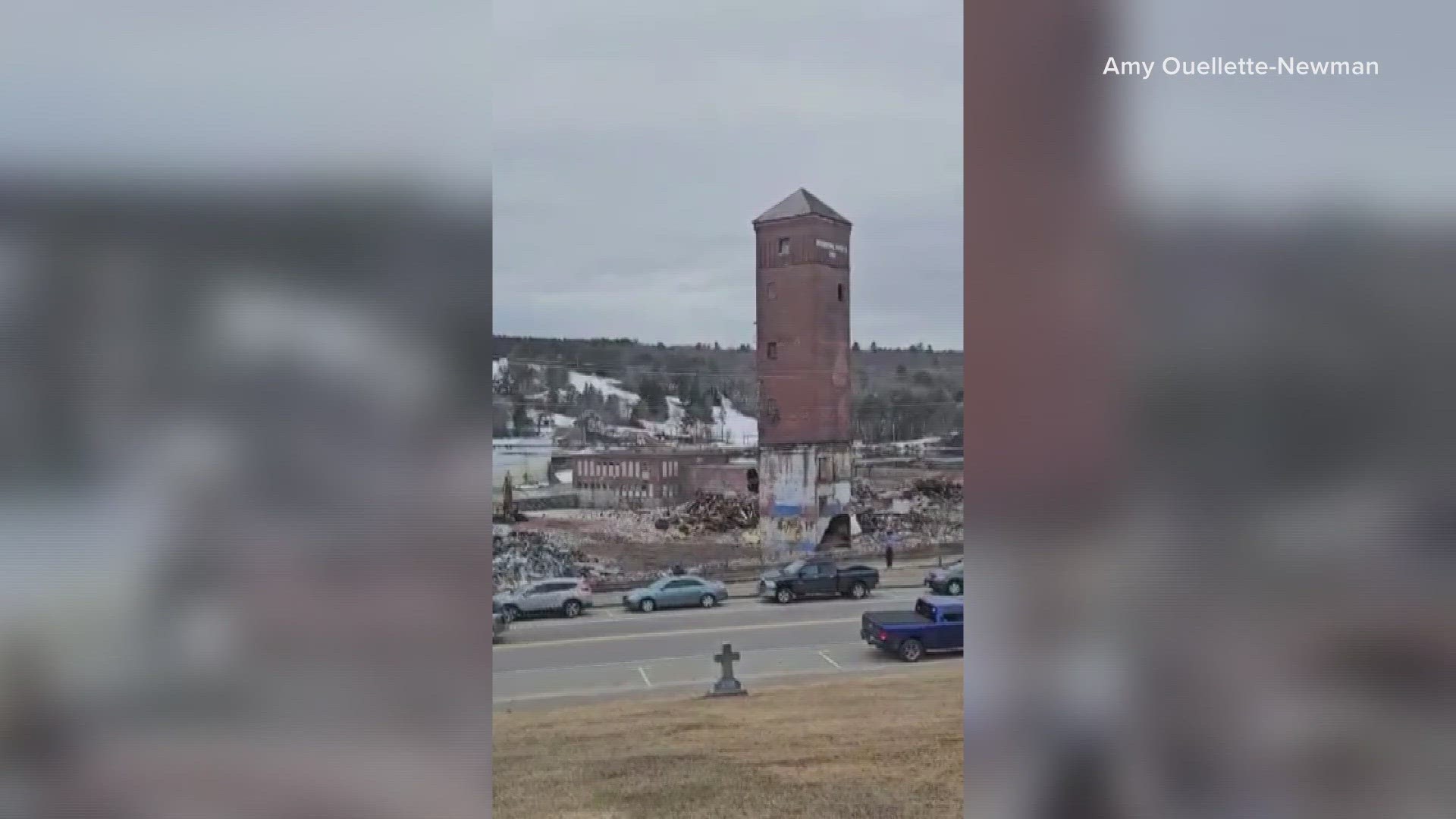 The brick tower at the former Otis Mill was demolished Monday. The tower was more than 100 years old.