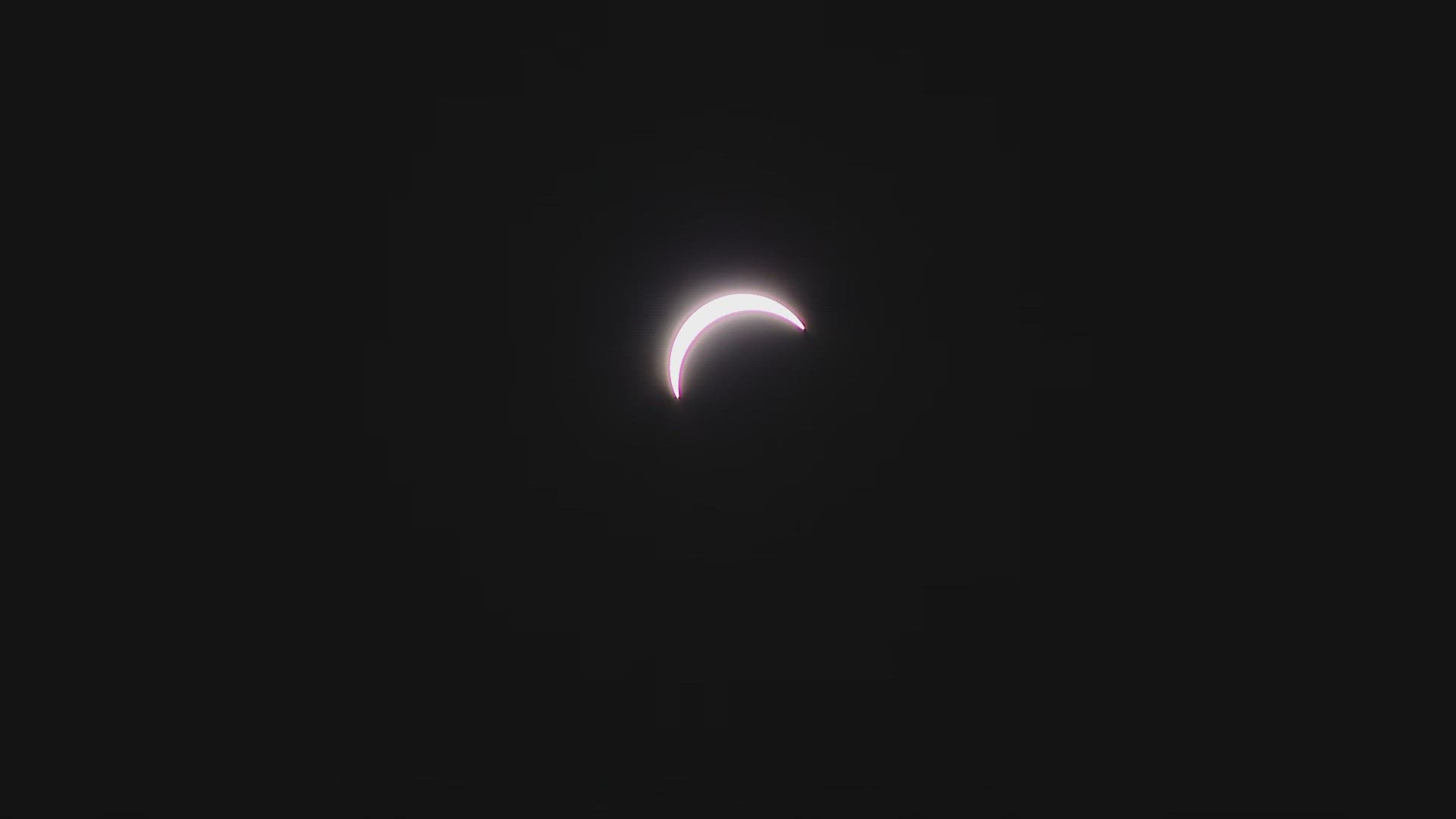 "The sky is clear, the sun is shining, and don't forget your sunblock," one woman ready to watch the eclipse said from Houlton on Monday.