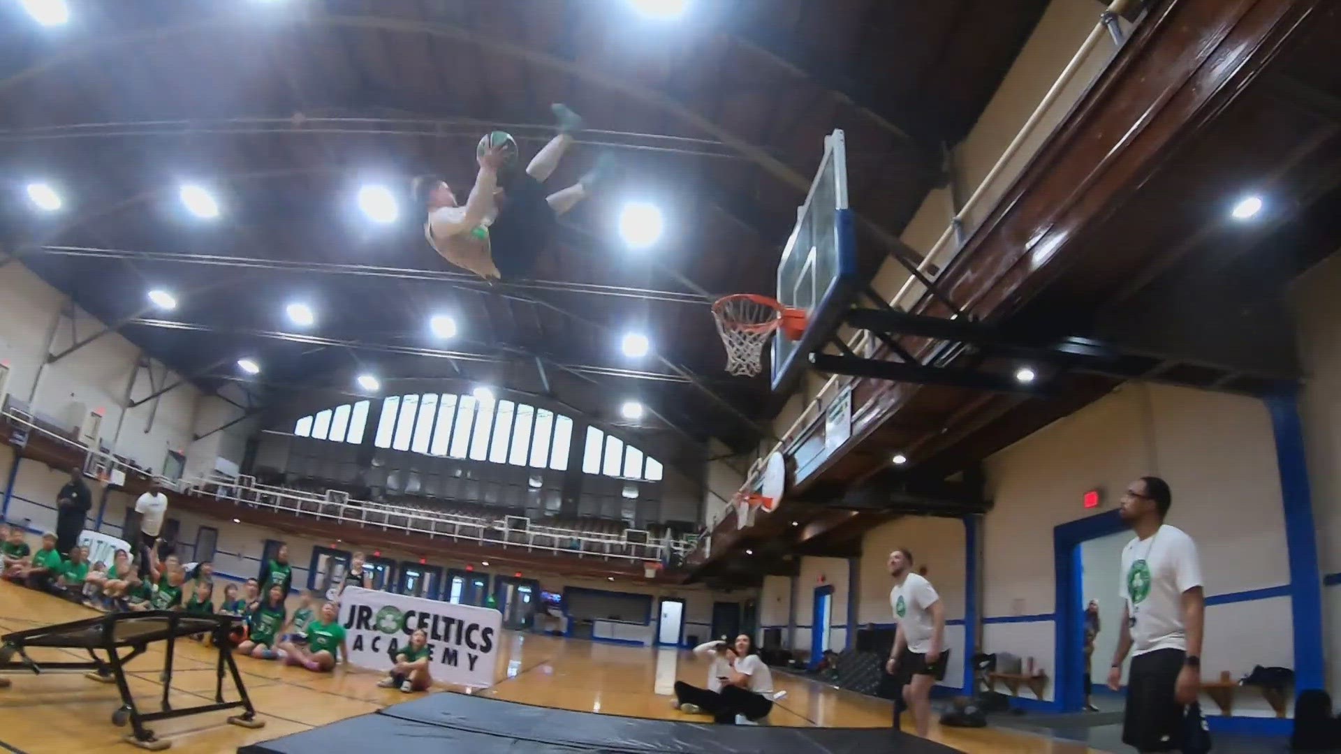 The mascot showed off his dunking routine inside the Lewiston Armory for 100 campers on Wednesday.