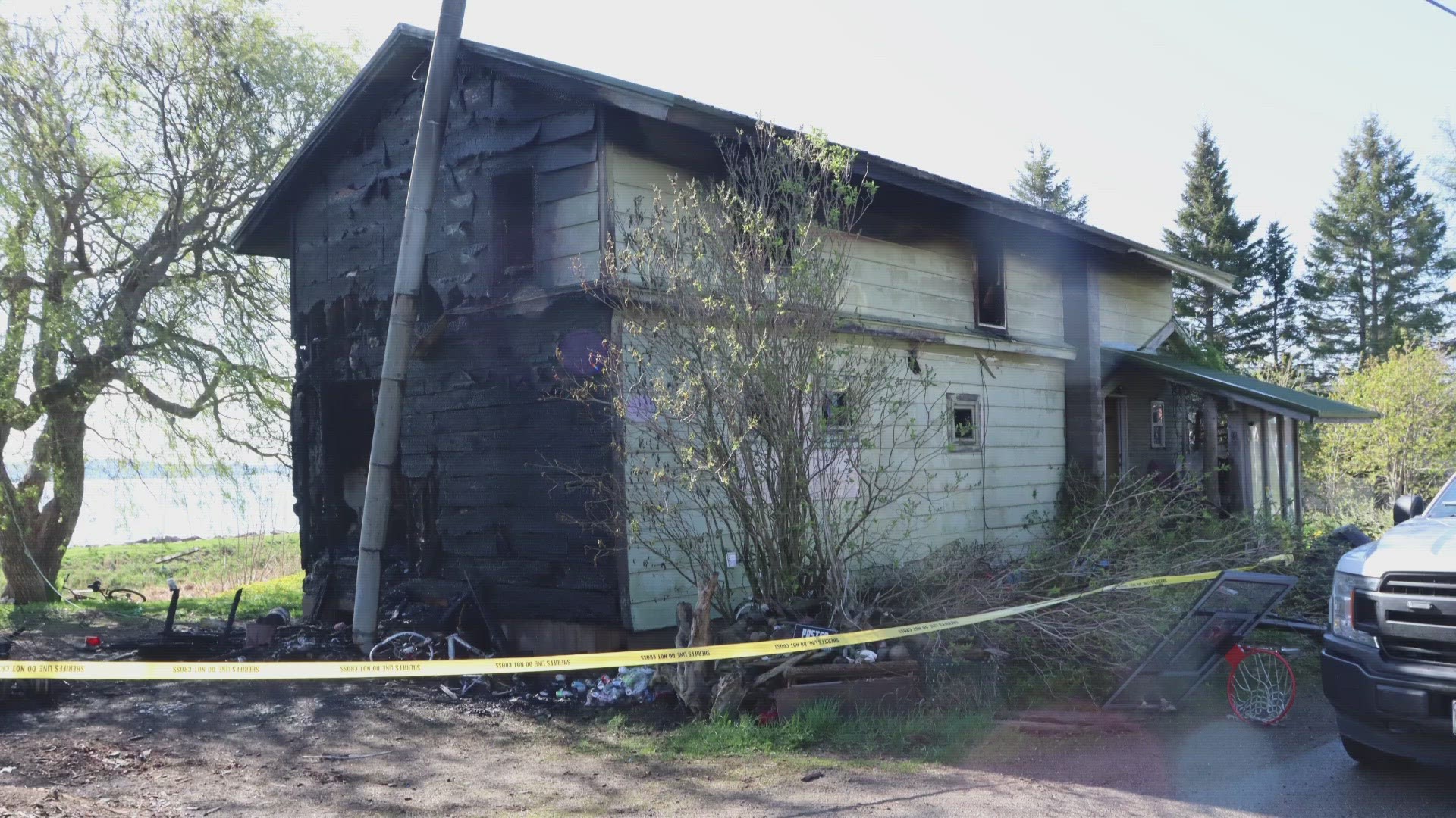 "The homeowner woke to the glow of a fire outside and along with the other family member was able to escape the fire with no injuries," officials said.
