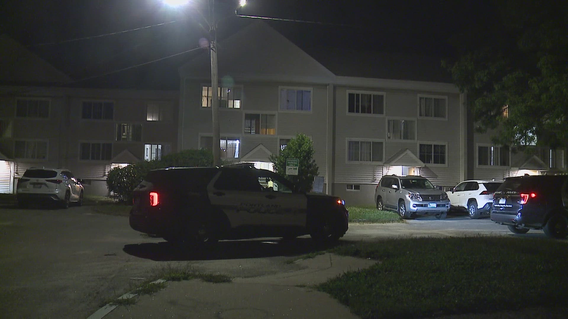 Police cruisers and a crime scene unit were seen outside an apartment complex Monday night.