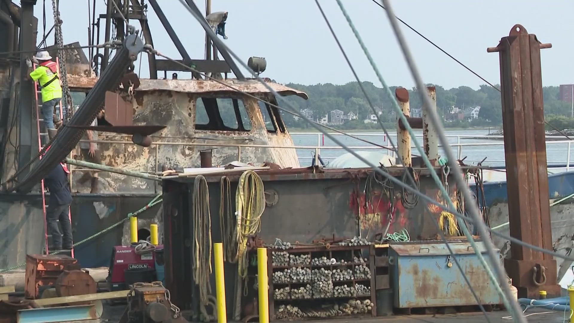 The vessel, The Three Girls, first caught fire Sunday in New Hampshire. Six fishermen on board had to be rescued by the Coast Guard.