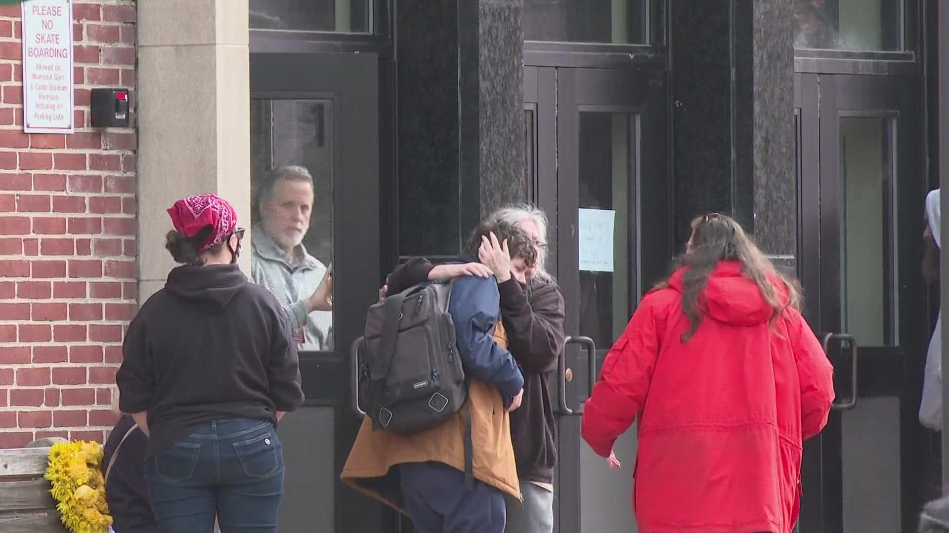 Students from Sanford High School were bussed to the Memorial Gym to be reconnected with parents following false reports of a school shooting on Tuesday.