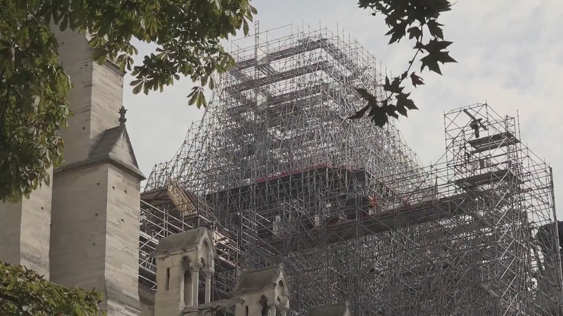 The cathedral's new reconstruction chief said he wanted the scaffolding around the spire to be taken down before Paris hosts the 2024 Summer Olympic Games.