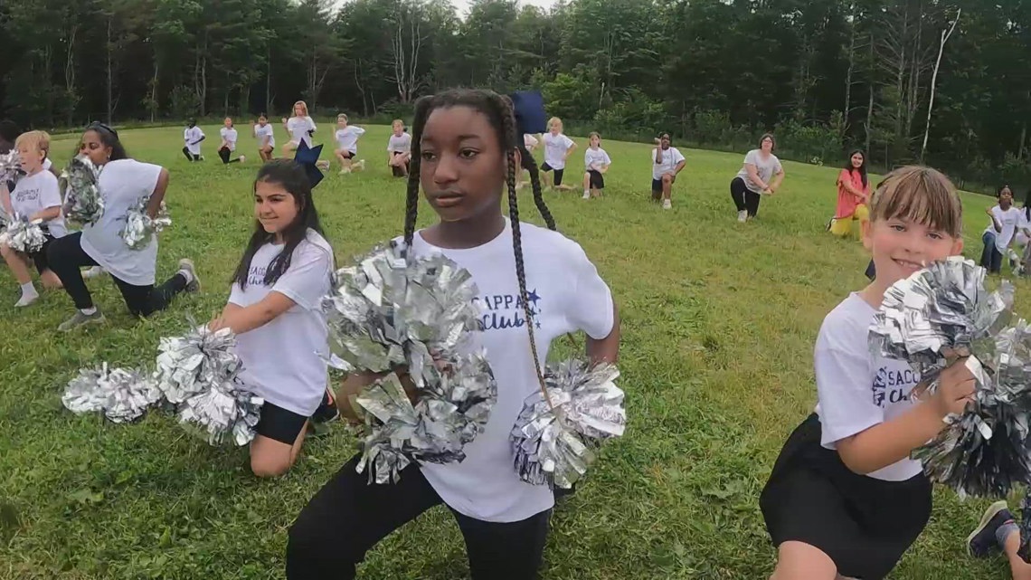 NFL cheer squad gifts pom-poms to Westbrook elementary school team ...