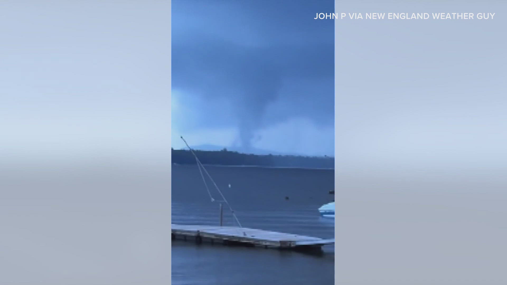 What appeared to be a rotating funnel cloud over the water was captured on video by multiple people Tuesday.