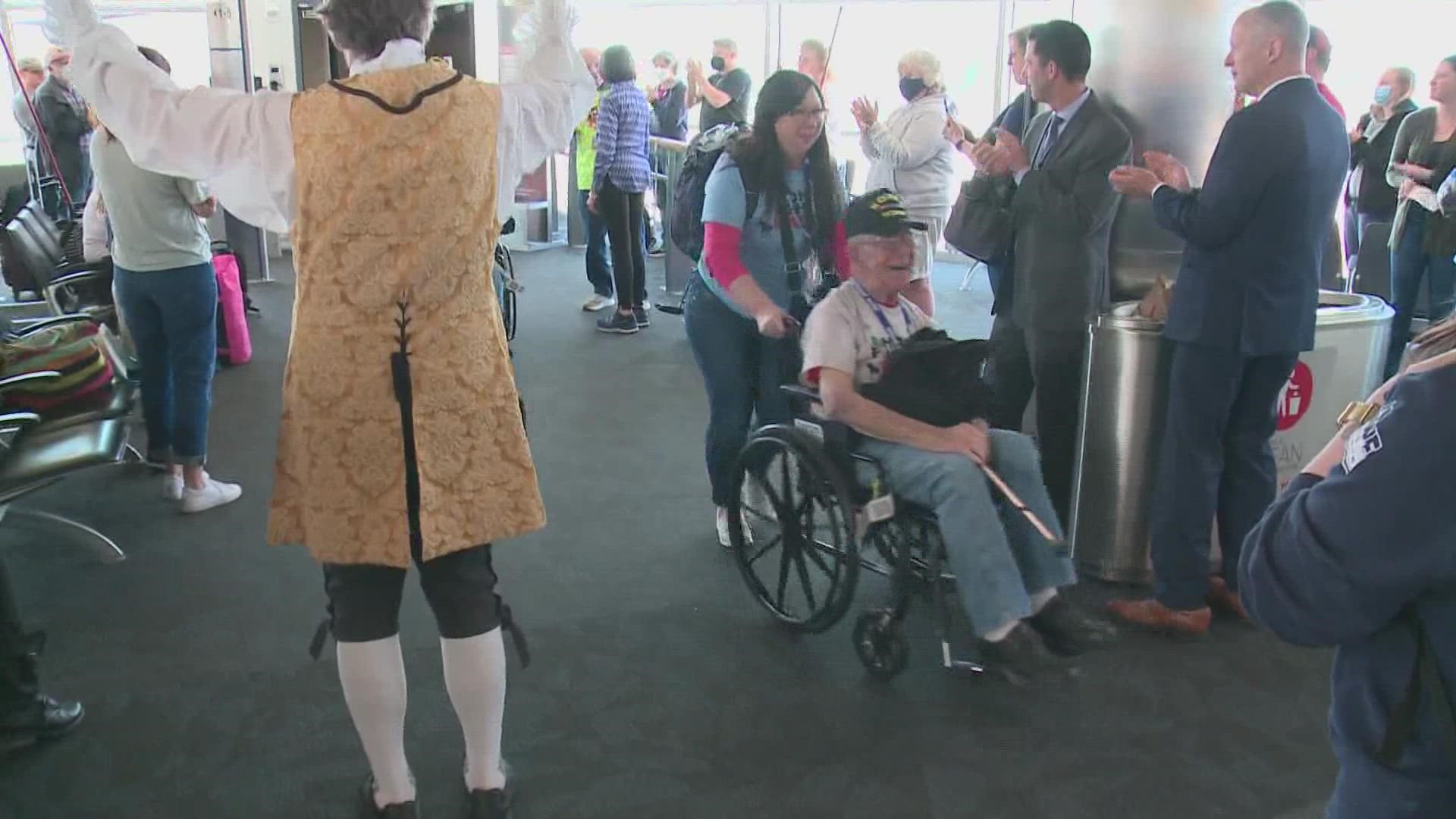 As they entered the Baltimore airport, the welcome for Honor Flight Maine veterans was as warm as ever.