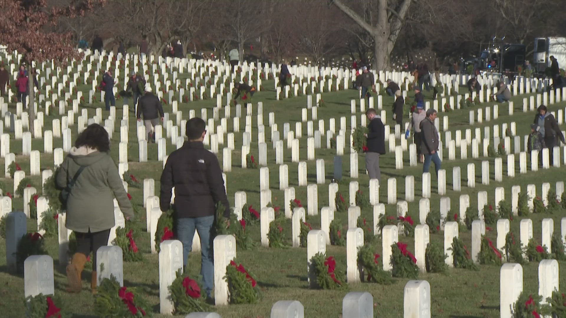 The wreaths were placed on headstones in the cemetery Saturday, by an estimated 80,000 volunteers, marking the annual national Wreaths Across America day.