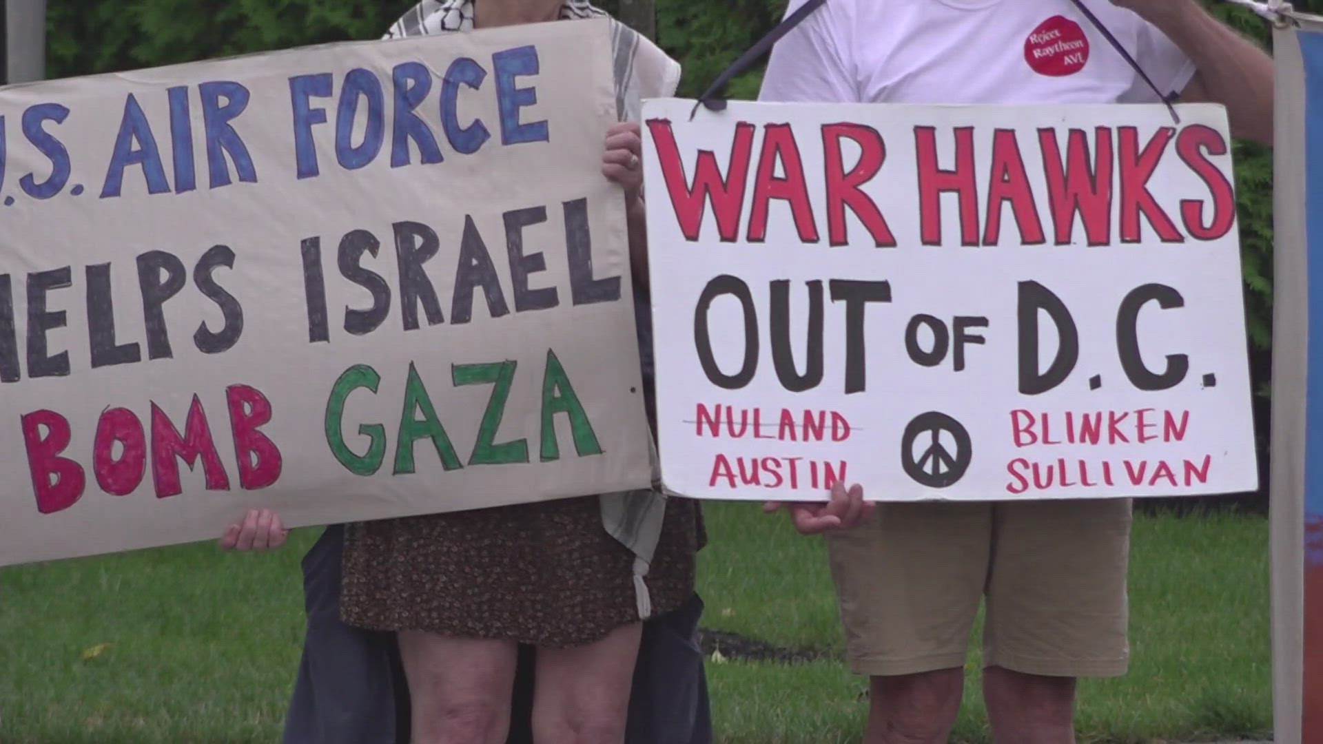 At the Great State of Maine Air Show in Brunswick, protesters gathered outside the gates raising ethical concerns over warplanes being used as entertainment.