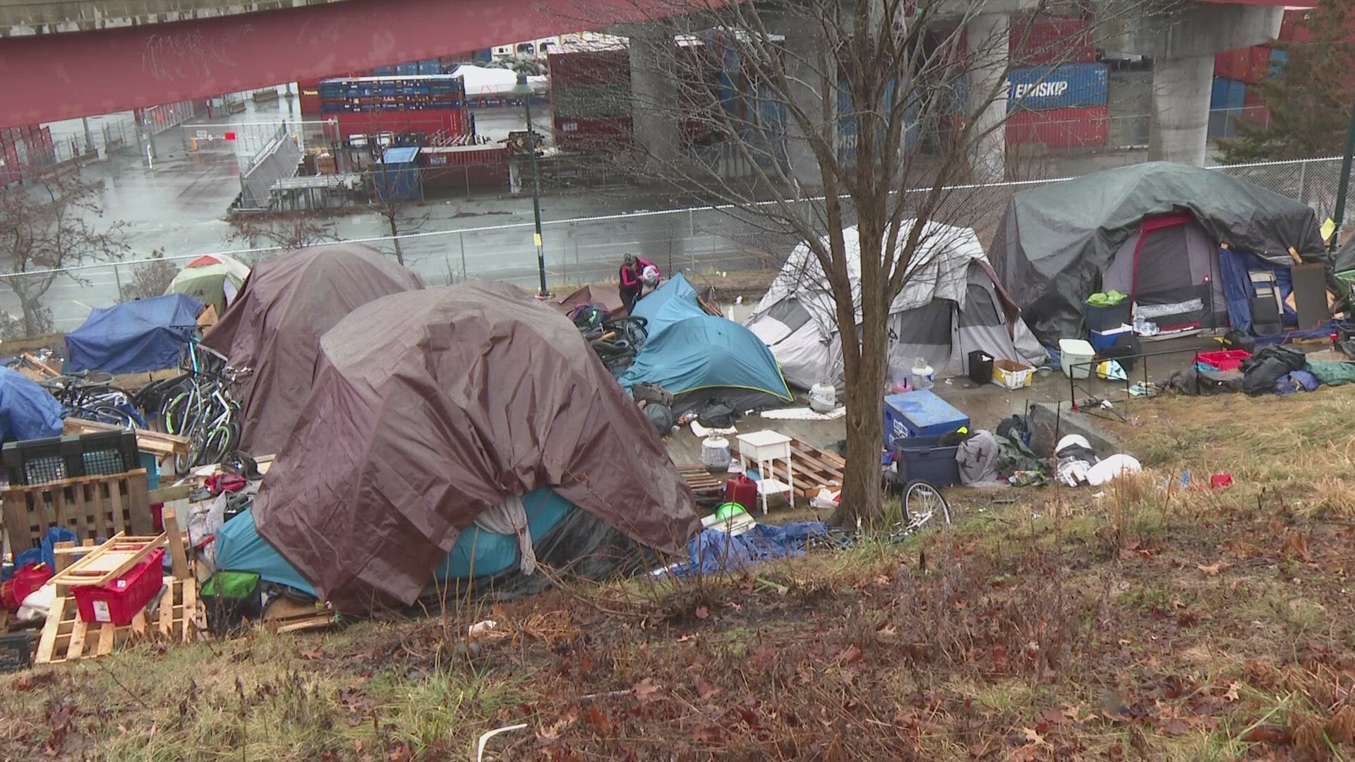 This is the second time the city has postponed the removal of a homeless encampment located under the Casco Bay Bridge.