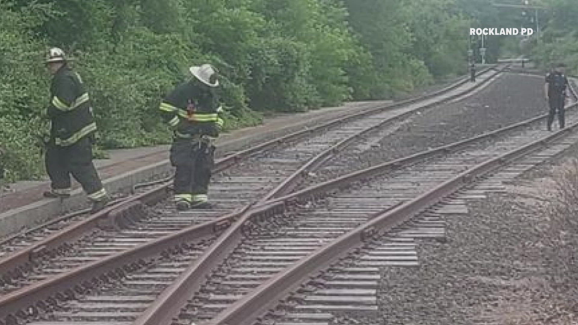 Rockland police said several "Molotov cocktail" type devices were found on the railroad tracks.