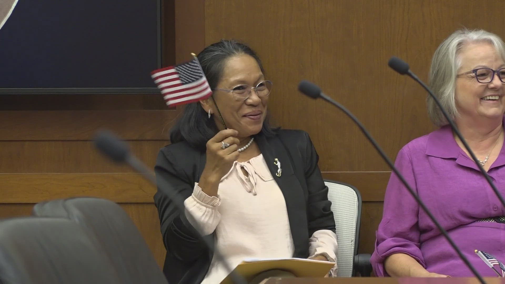 Supported by friends and family, 30 people became naturalized citizens at the United States District Courts in Bangor on Friday.