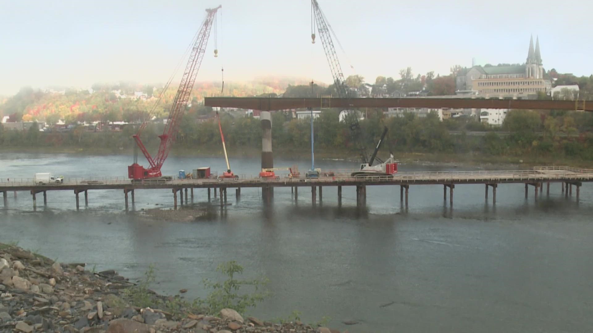The international bridge is on schedule and expected to be completed by the fall.