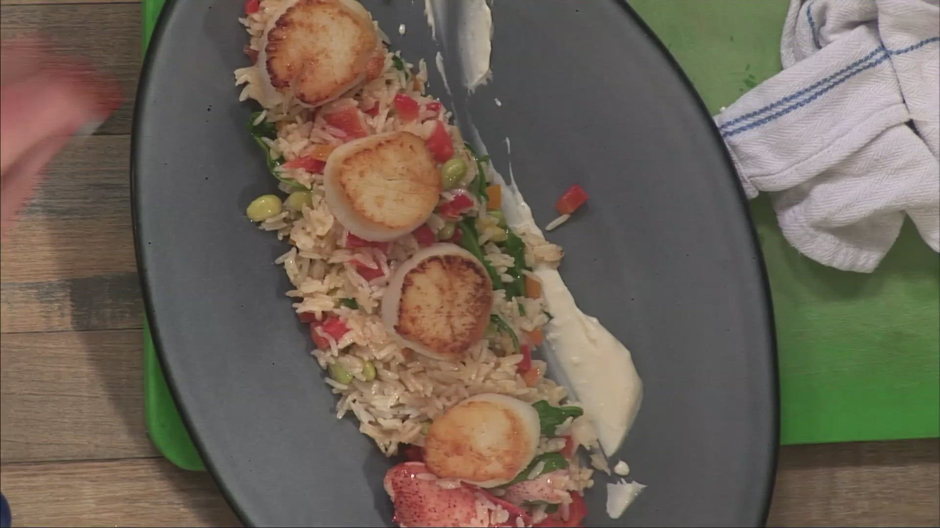 Chef Gil Plaster from The Tiller at Cliff House Resort prepares a delicious blend of spices and fresh Maine seafood.