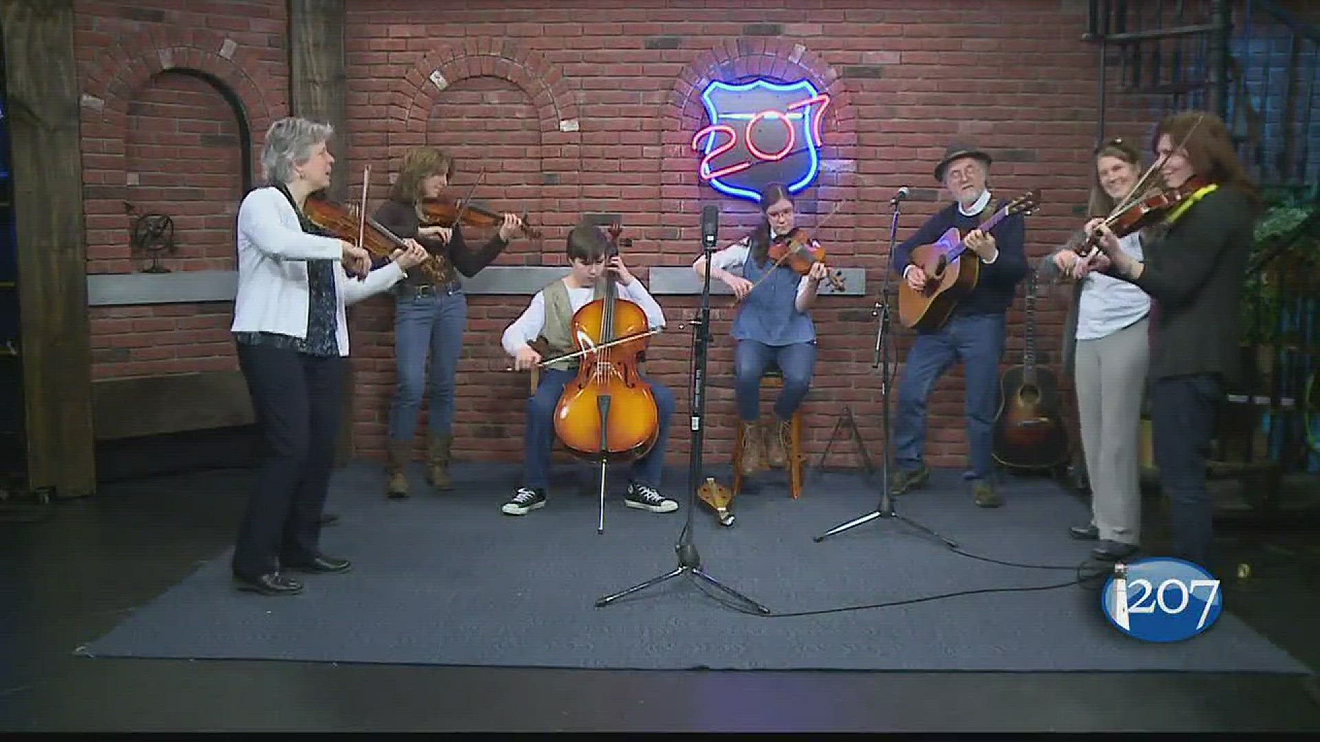 The New Hampshire Fiddle Ensemble is made up of 65 (or so) regular members. They play together and also do tricks, like the Harlem Globetrotters of stringed instruments.