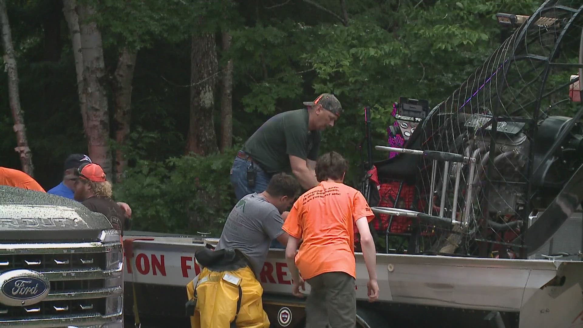 A game warden says they rescued four people from the river Monday.