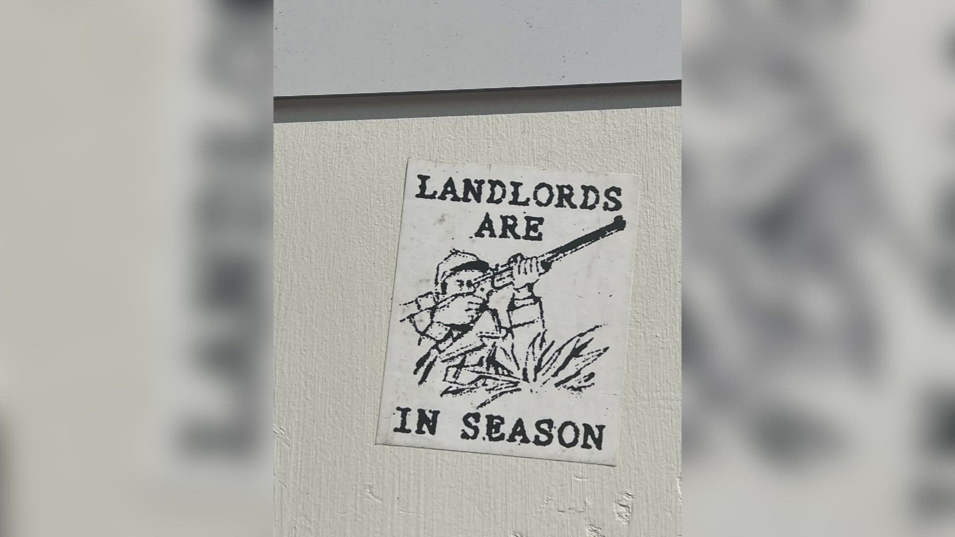 The sticker was found on the doorframe of Vitalius Real Estate Group's building in Portland earlier this week.