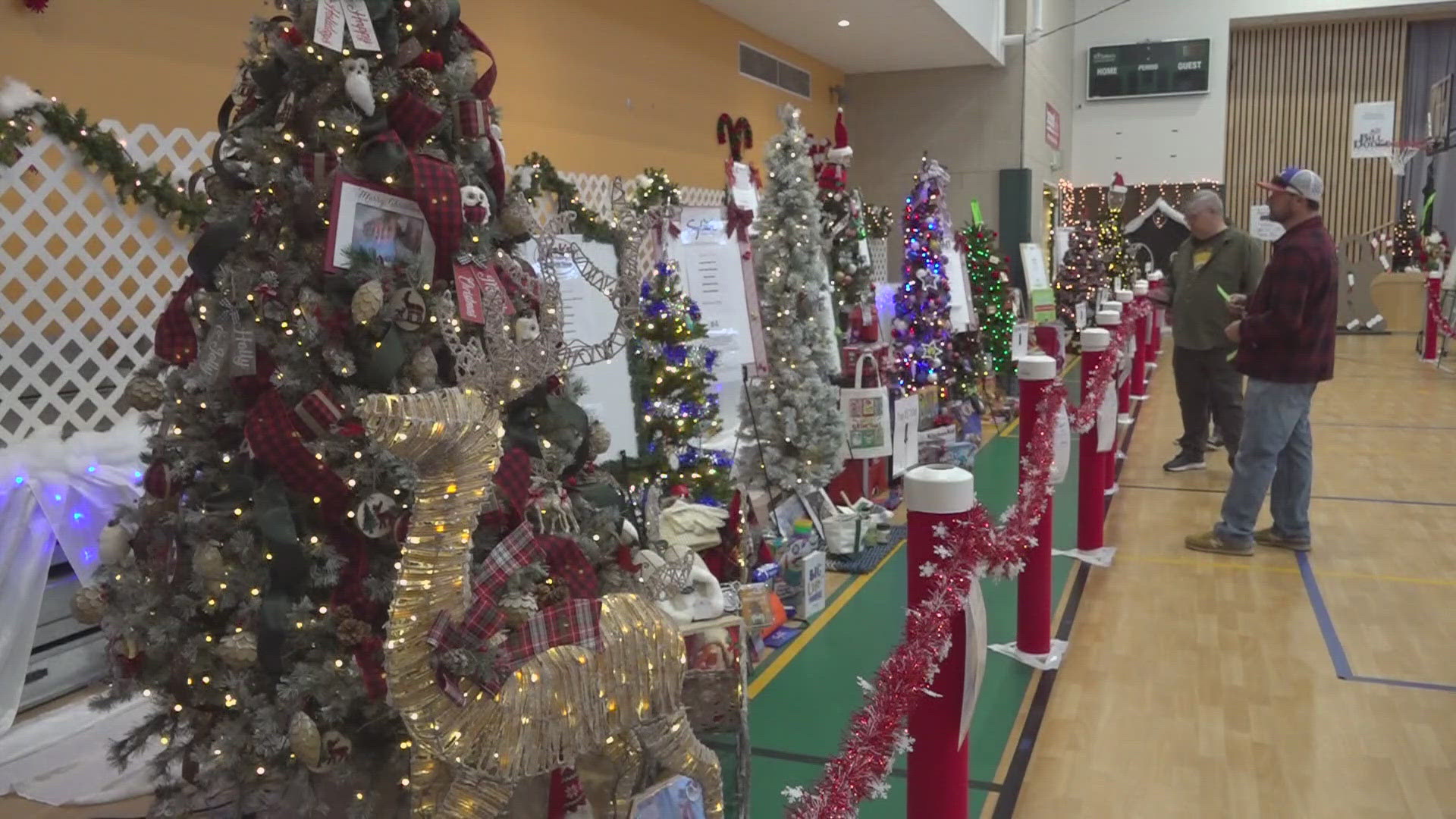 Every year, several community businesses and organizations decorate holiday trees sprinkled with gifts and prizes, which get raffled off.