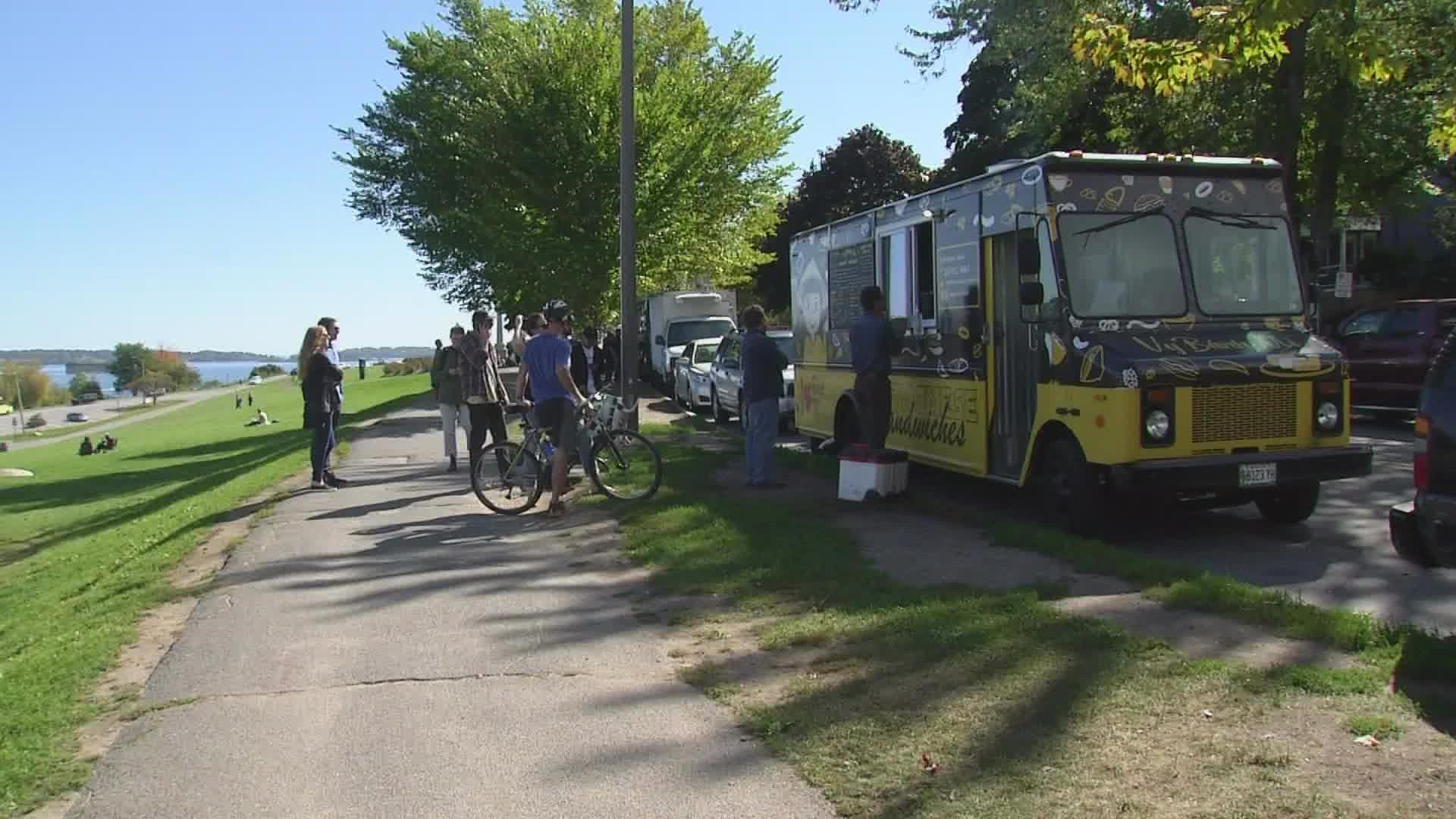 Some options would call for the elimination of as many as 30 street parking spaces and charge license fees to food truck owners of approximately $5,000.