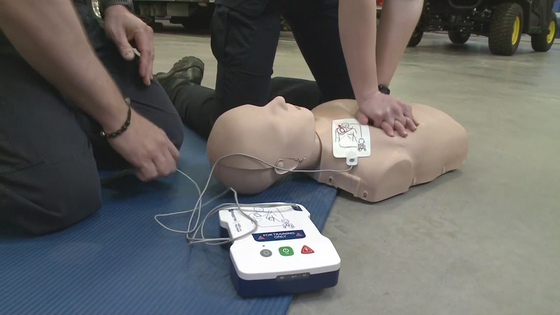 An AED, or an automated external defibrillator, is used to shock the heart of someone in cardiac arrest to correct the heart rhythm and restart the heart.