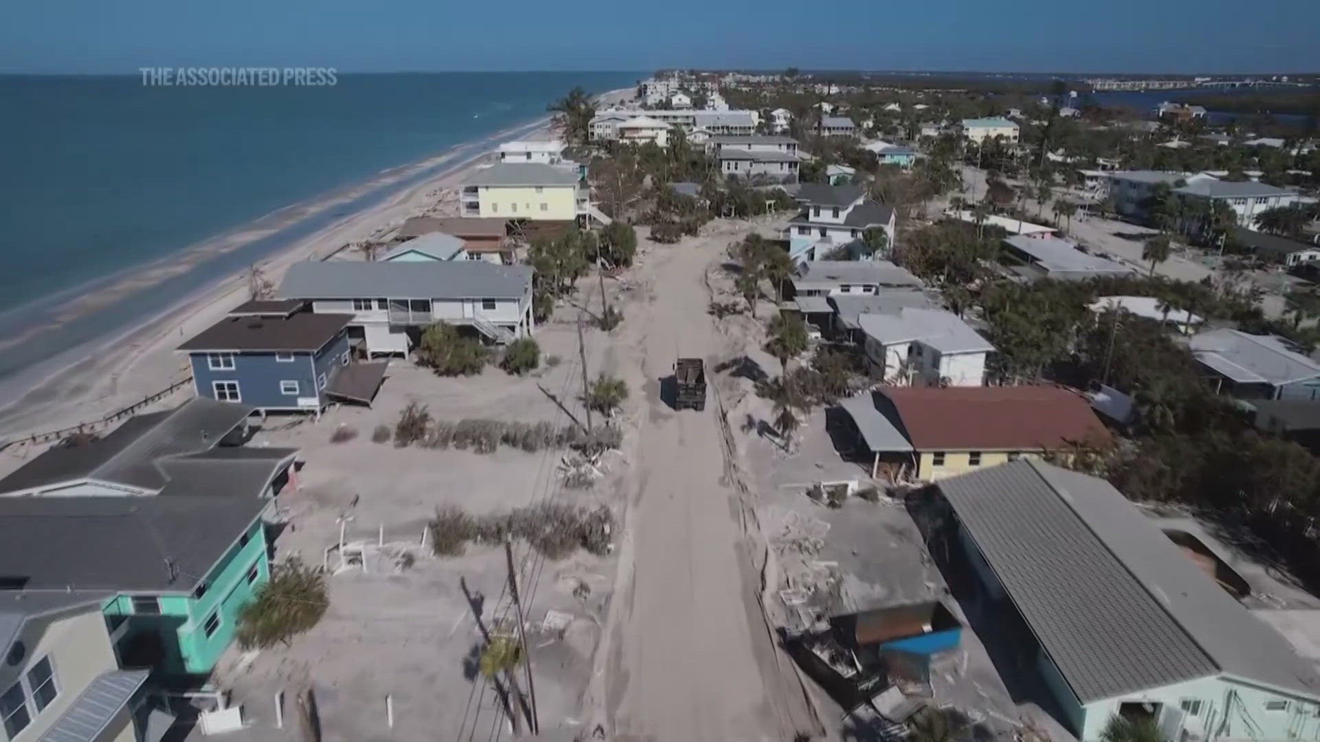 For many, the storm surge as high as 10 feet brought piles of sand into their homes, creating barriers for people trying to dig their way out.