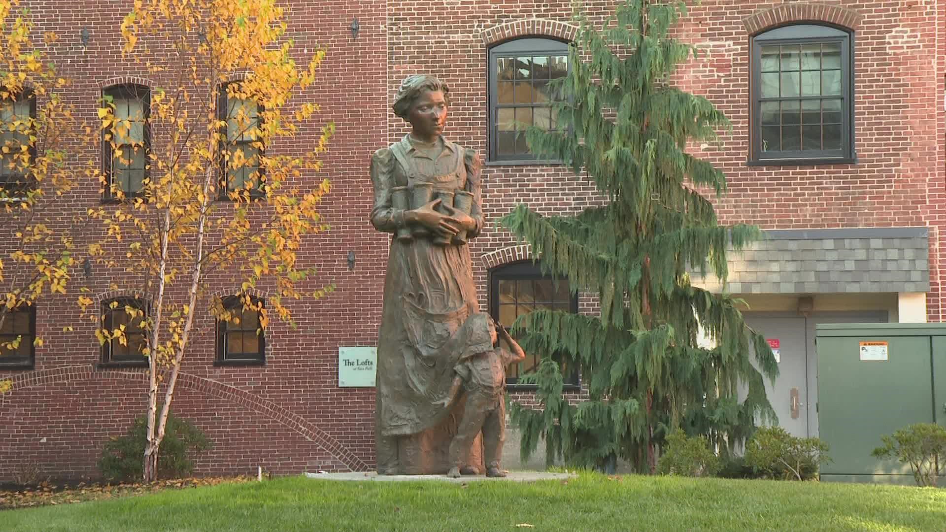 “Can you see me?” is a bronze statue that sits in the courtyard at The Lofts at Saco Falls, depicting a woman mill worker and her child.