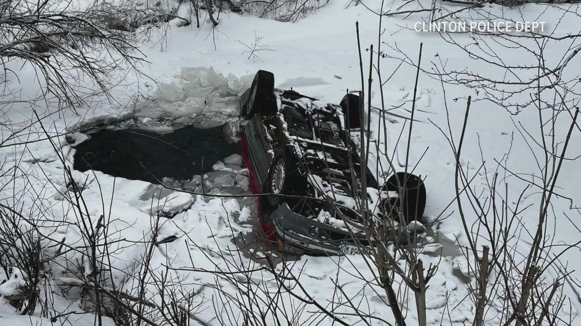 Ice had formed around the vehicle, which was upside down, when first responders arrived at the scene, according to Clinton police.