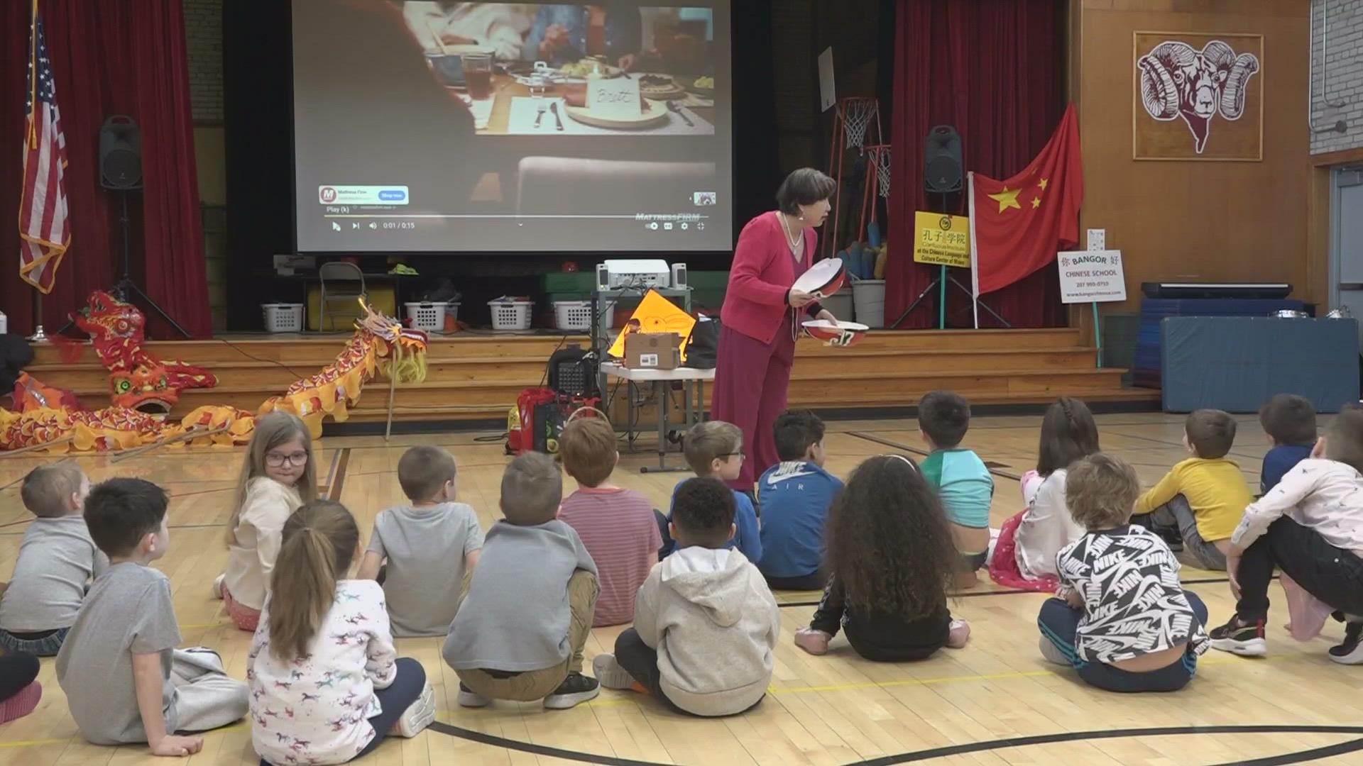 Jing Zhang, president of the Bangor Chinese School, visited the school on Thursday and helped introduce the children to different Chinese customs.