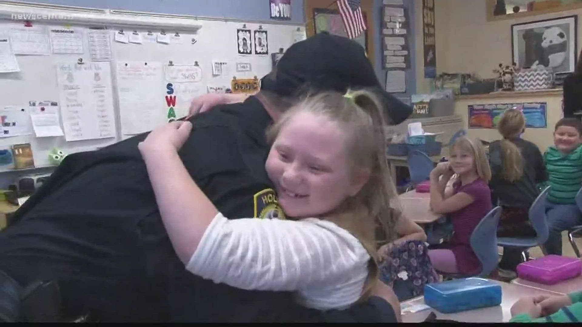 NOW: Holden Police Chief delivers teddy bears to classroom