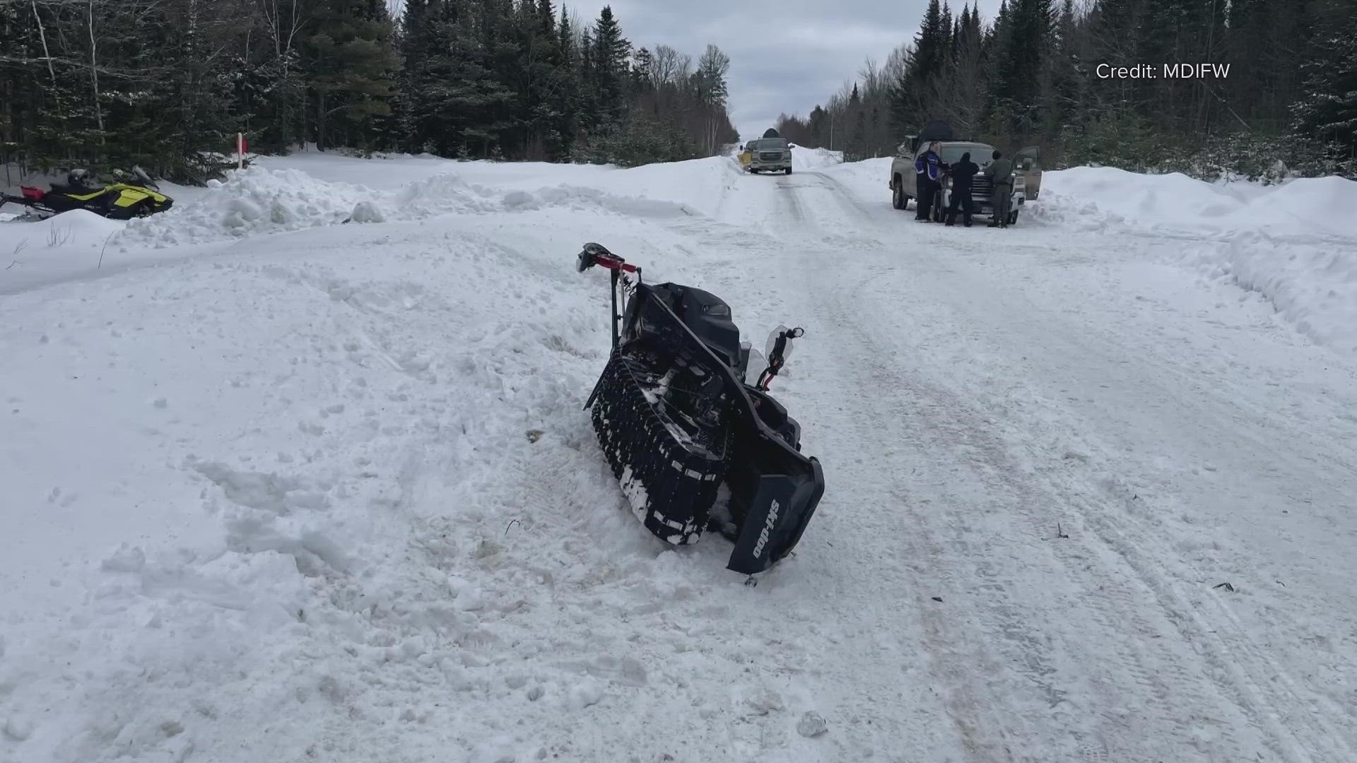 The snowmobile driver failed to stop at the crossing on Grand Lake Road Tuesday afternoon, according to the Maine Department of Inland Fisheries & Wildlife.