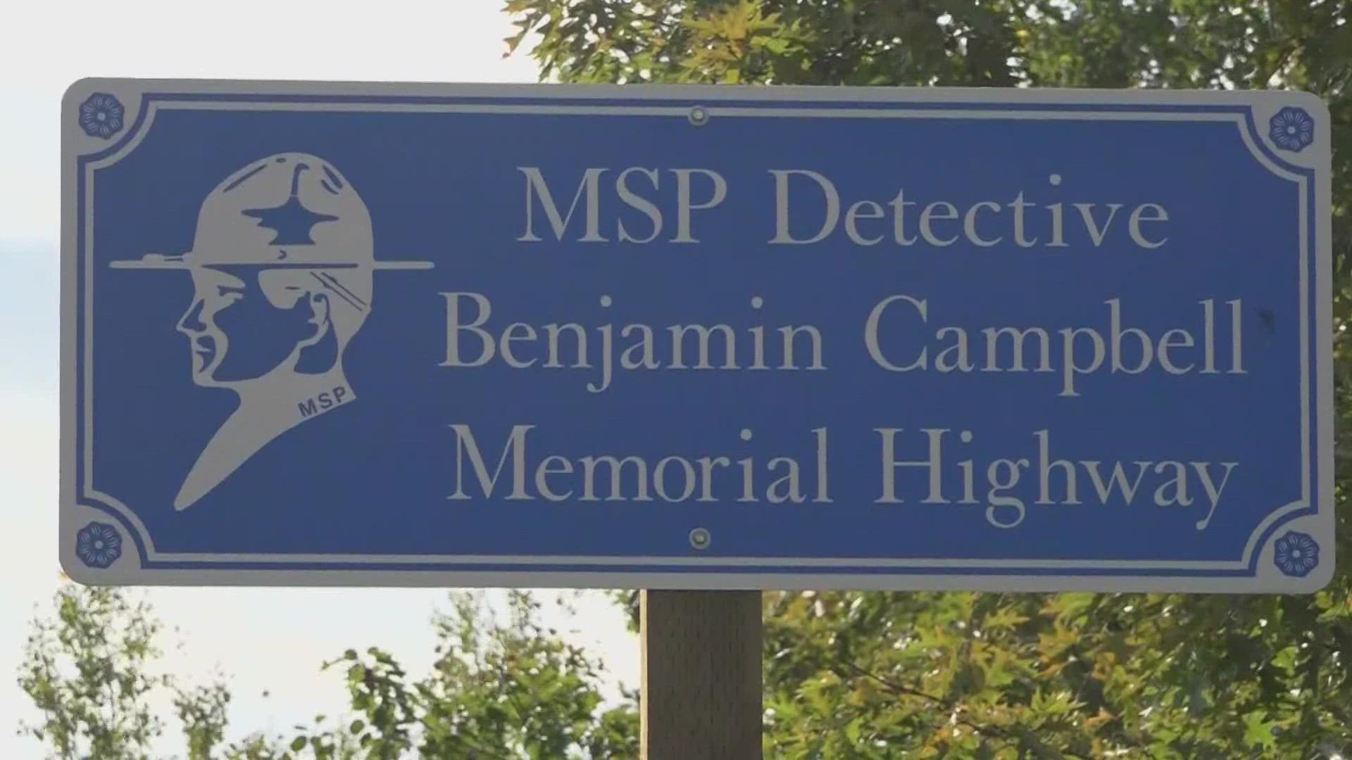 Family, friends and coworkers of Detective Benjamin Campbell gathered on a part of route 202 to unveil and dedicate the memorial sign.