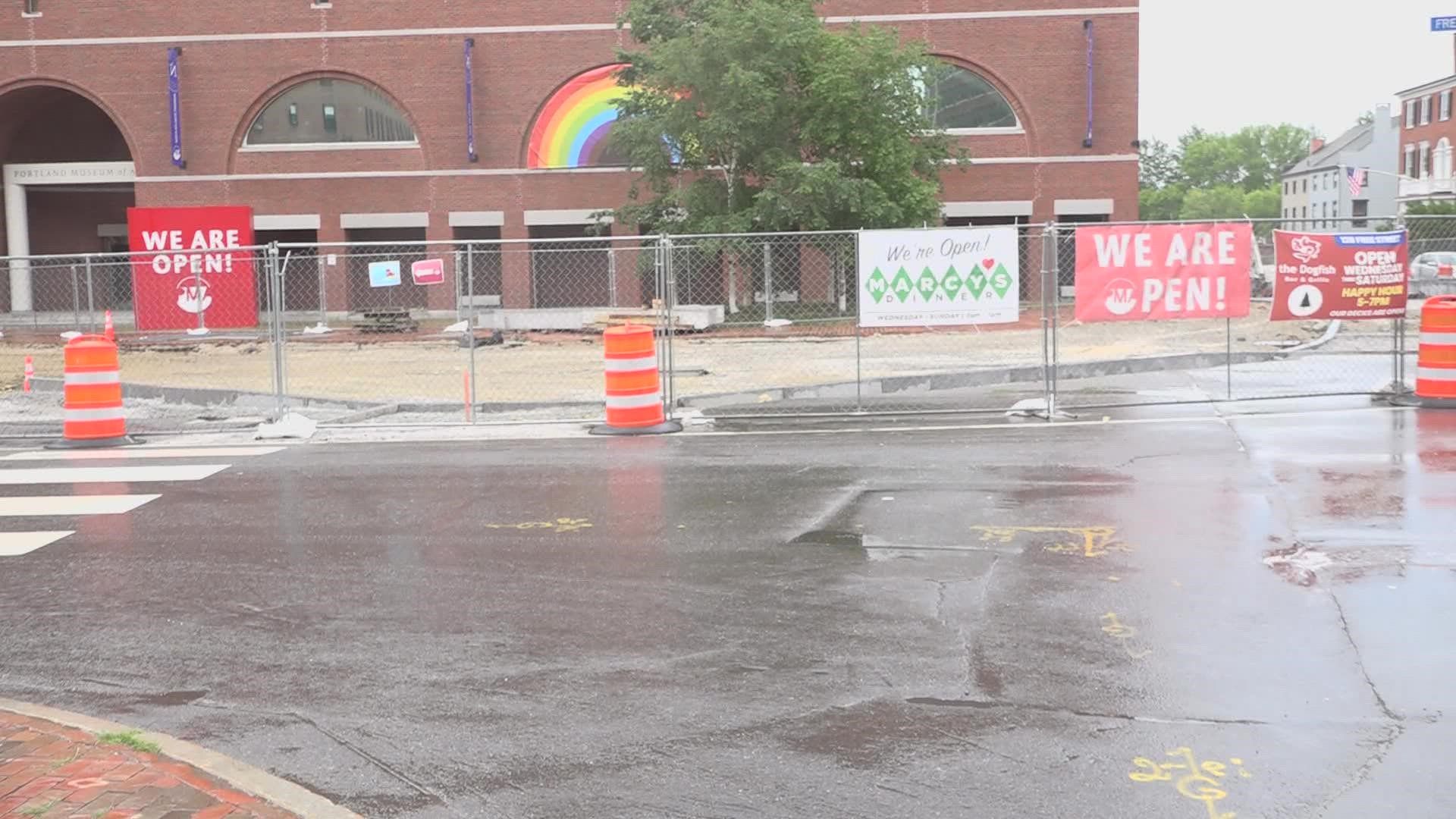 The first phase of the four-phase Congress Square redesign is delayed indefinitely while nearby businesses await their turn under the veil of construction fences.