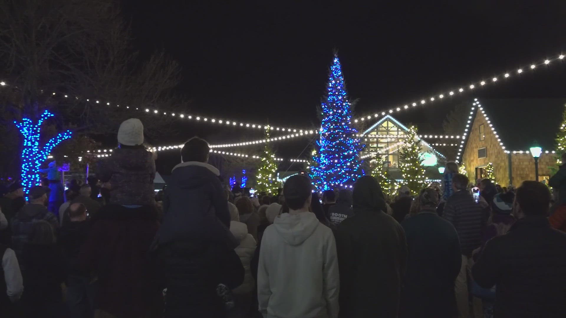 Hundreds gathered outside the flagship store in Freeport for the lighting ceremony. The tree was lit with 250,000 blue and white lights in honor of Lewiston.