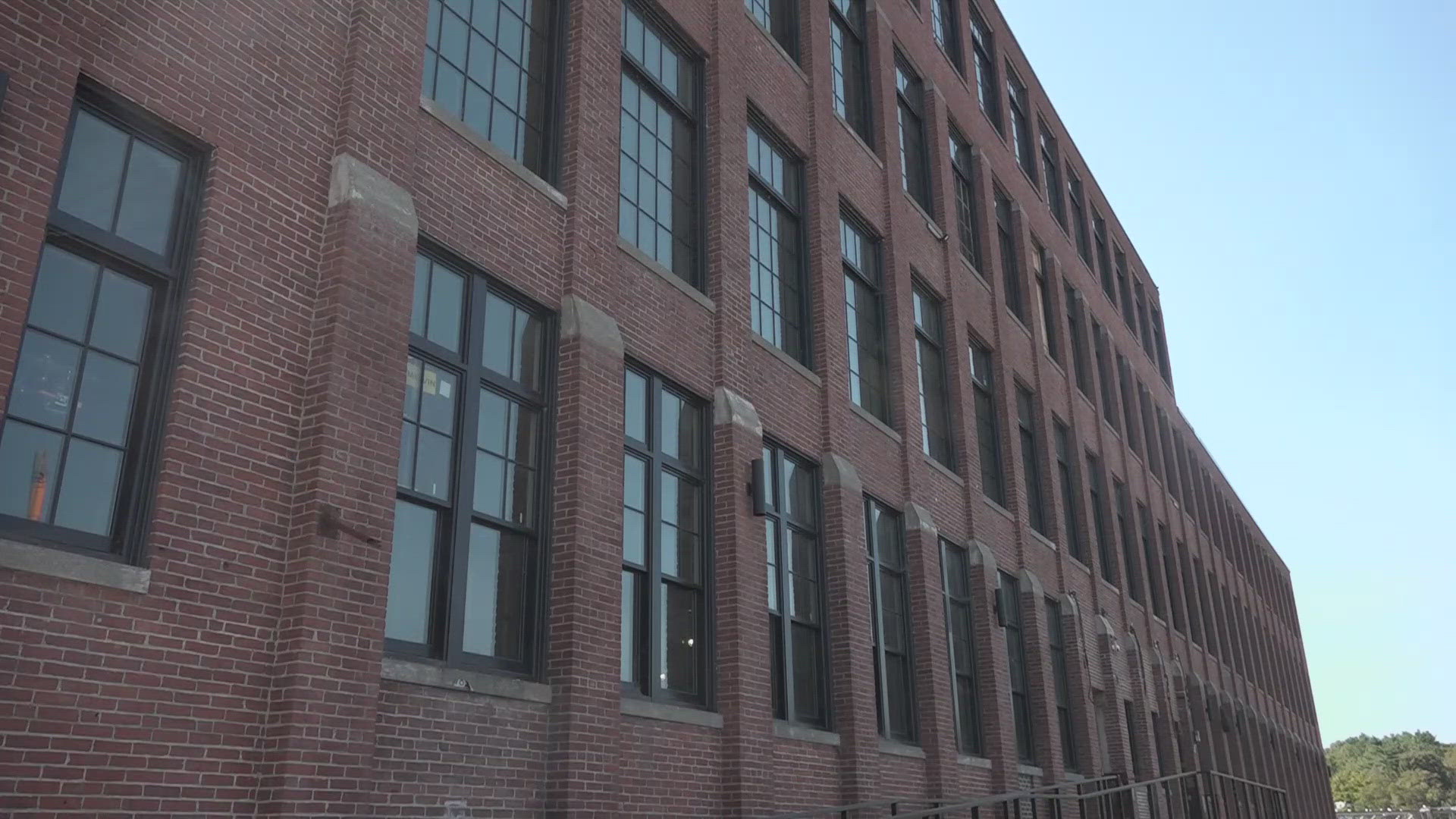 After a series of storms and flooding last winter slowed construction to a halt, officials say the project at the former textiles mill is now back on track.