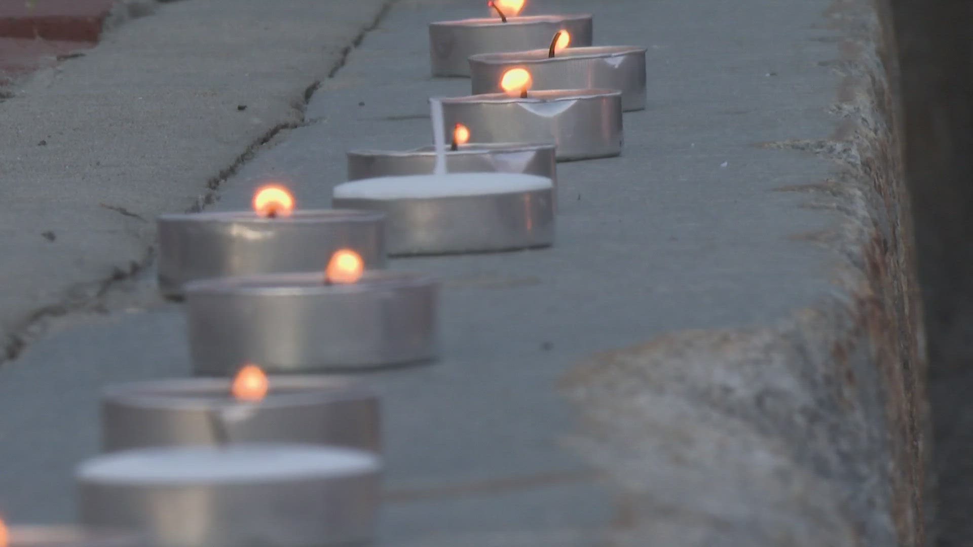 People gathered to remember the two people shot and killed in front of their kids earlier this week in Westbrook.